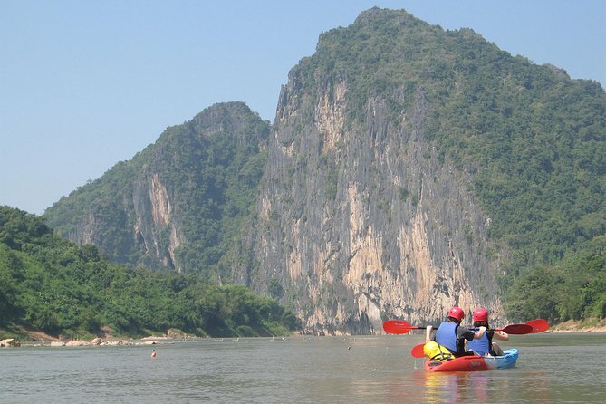 FULL DAY – Kuang Si Waterfall, Kayak on the Nam Ou / Mekong River, Pak Ou Caves - Why this day trip works so well around Luang Prabang