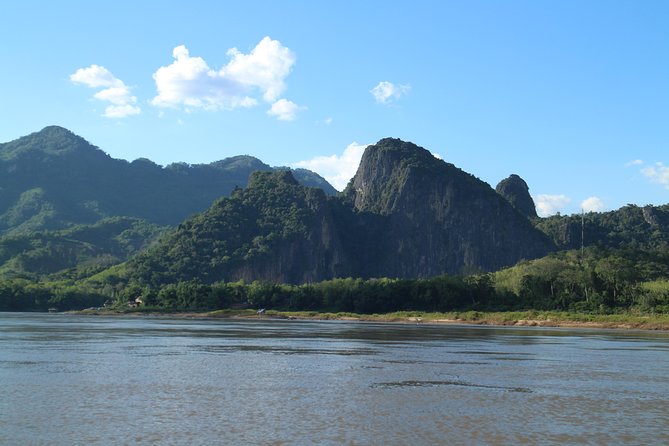 FULL DAY – Kuang Si Waterfall, Kayak on the Nam Ou / Mekong River, Pak Ou Caves - A short Mekong paddle to lunch