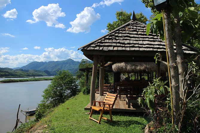 FULL DAY – Kuang Si Waterfall, Kayak on the Nam Ou / Mekong River, Pak Ou Caves - Paddling beneath Pha Aen on the Nam Ou