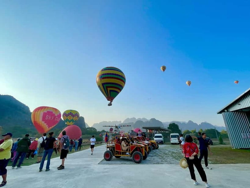 Hot Air Balloon in VangVieng pick up-drop off - Watching five balloons come to life