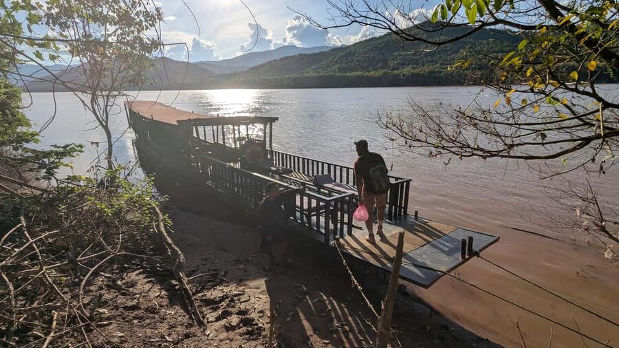 Luang Prabang: Afternoon Kuang Si Waterfalls & Sunset Cruise - Boarding the Mekong boat near sunset