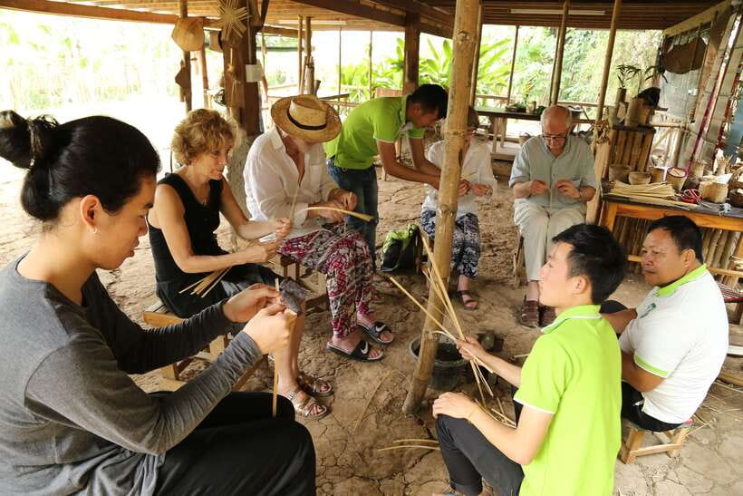 Luang Prabang: Bamboo Weaving Workshop & Cooking Class - Cutting bamboo and making a small mat