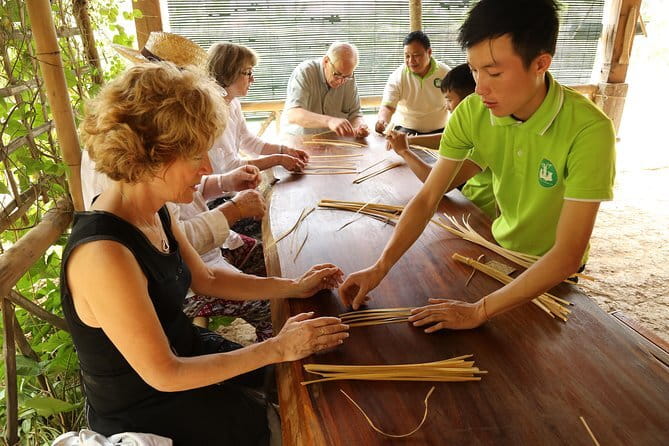 Luang Prabang Cooking, Pottery & Candle Experience - Shaping clay at P70