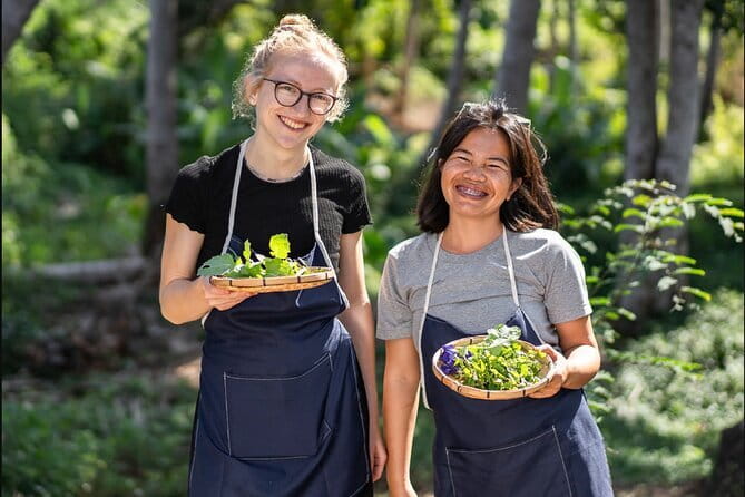 Luang Prabang Cooking, Pottery & Candle Experience - Making flower candles with local beeswax