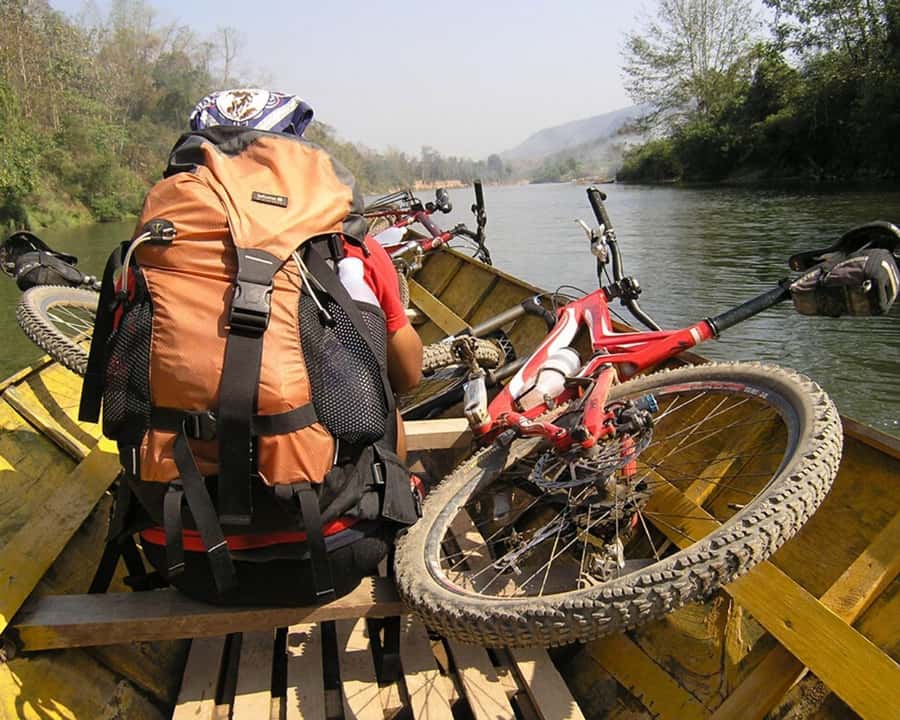 Luang Prabang: Countryside Mountain Bike Tour with Lunch - Leaving town beside the Mekong
