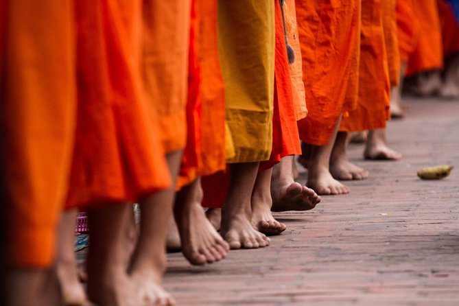 Luang Prabang Early Morning Alms Giving and Wet Market - Photography needs restraint