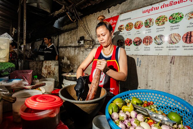 Mekong Meals Food Tour with 15+ Tastings - Meeting a monk and learning about Luang Prabang life