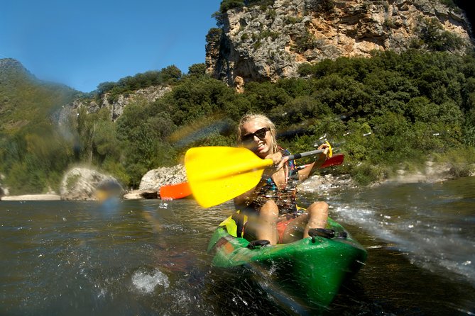 One Day Guided Tour: Kayaking, Zipline & Tubing In The Cave from Vang Vieng - Tubing between the three river stations