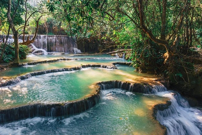Pak Ou Caves and Kuang Si Fall Day Tour - Cruising the Mekong to Pak Ou Caves