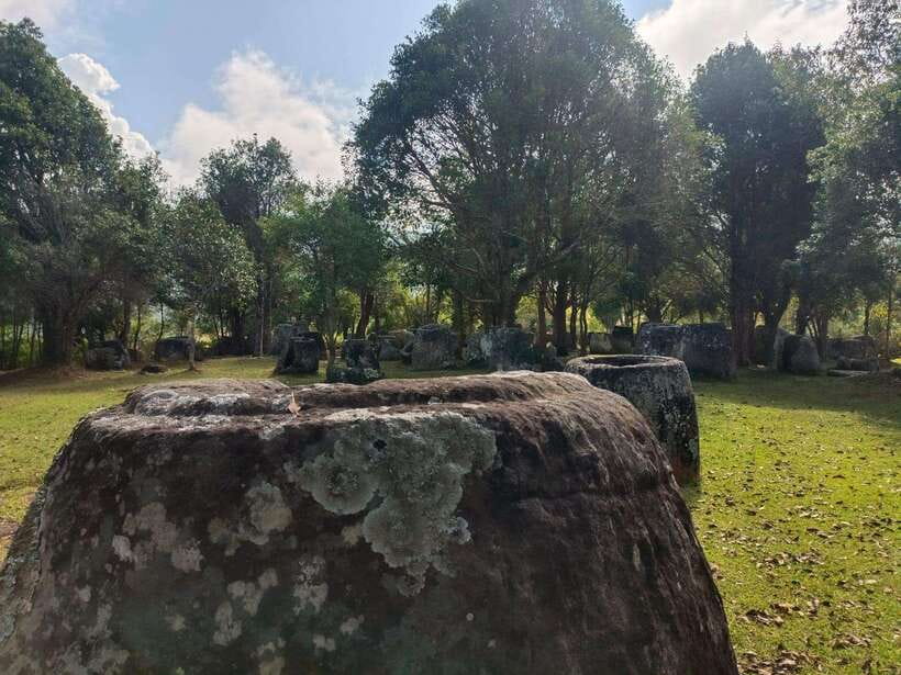 Plain of jars share group tour - Site 3 at Ban Xieng Di and the rice-field walk