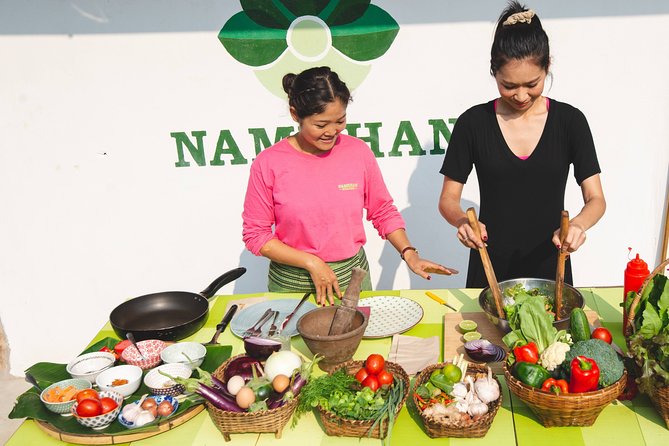 The Namkhan - Cooking Class - Picking vegetables in the organic garden