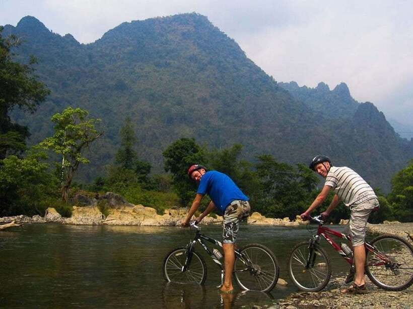 Vang Vieng: Blue Lagoon and Countryside Bike Tour with Lunch - Crossing the Nam Song River