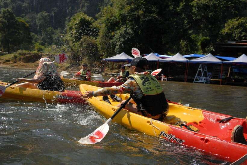Vang Vieng: Day Tour with Kayaking, Ziplining, and Rafting - Lunch with a local flavor