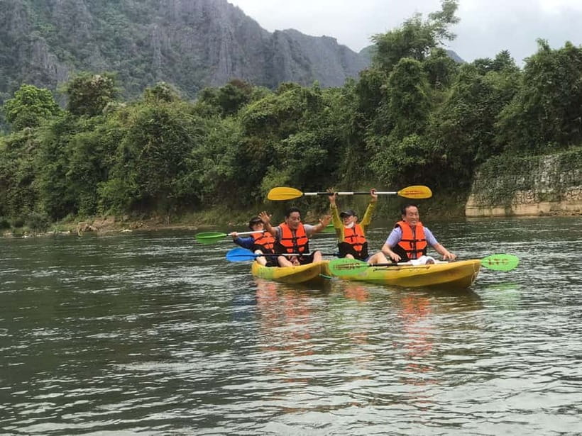 Vang Vieng: Day Tour with Kayaking, Ziplining, and Rafting - Pickup, tuk-tuk rides, and the practical start