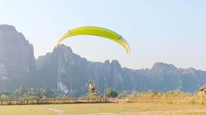 Vang Vieng: Paragliding Experience with Hotel Pickup - Choosing sunrise or the afternoon flight