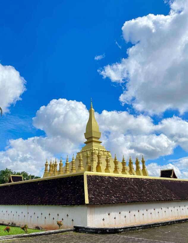 Vientiane: Half-Day City Tour with Patuxai and Buddha Park - That Dam and the stories behind the Black Stupa